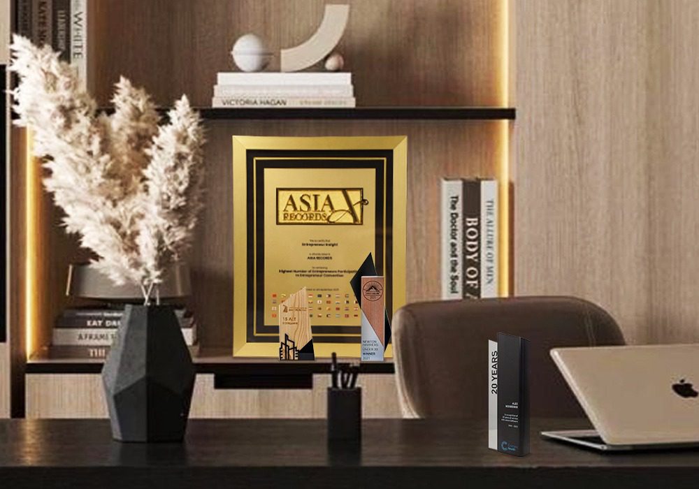 Asia Record Certificate proudly sits among other awards in a office background
