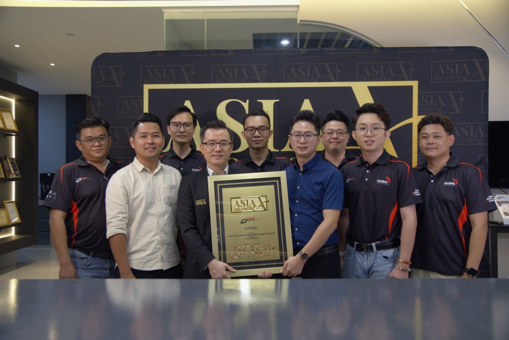 Group photo at Drive Fit office with Asia Record